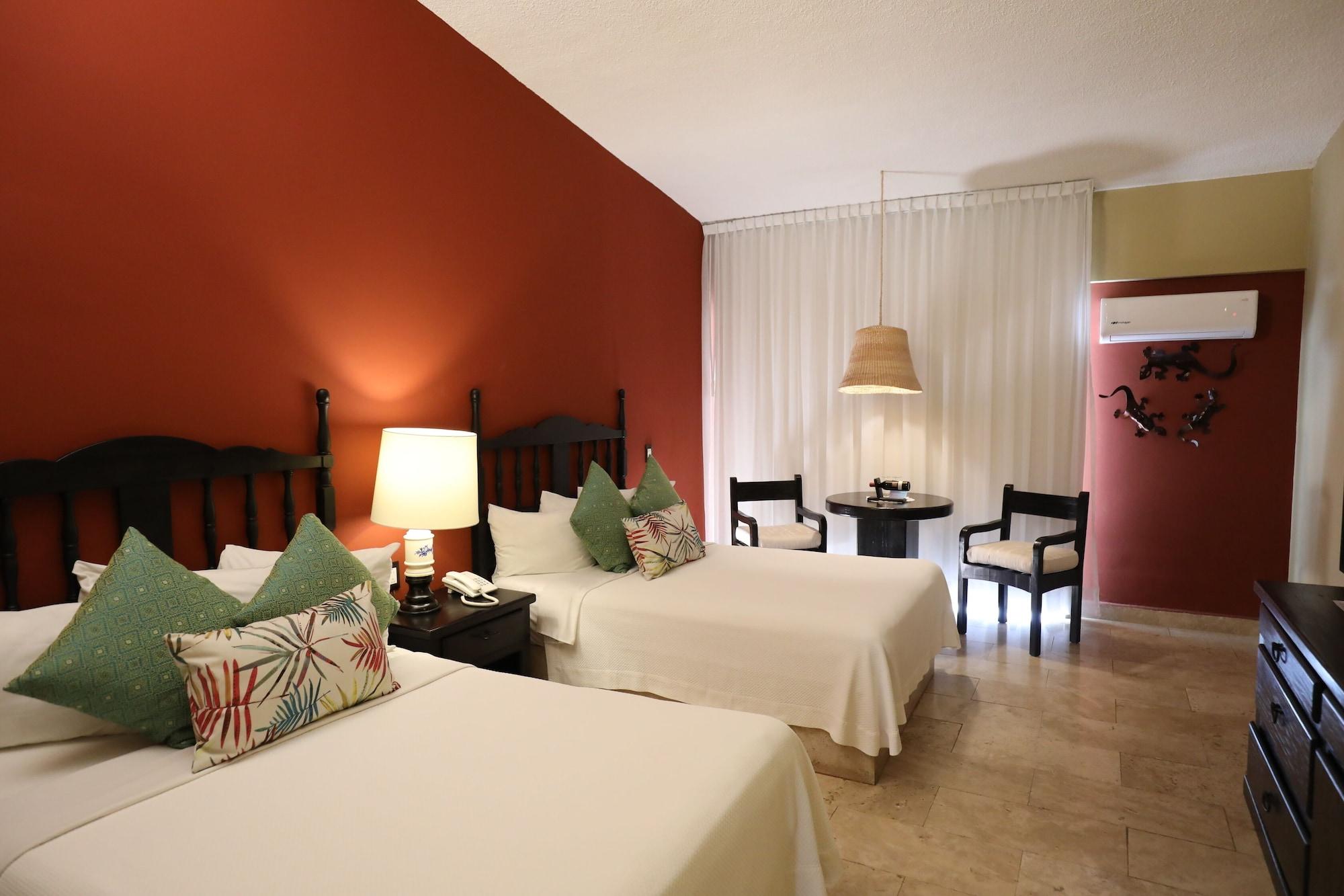 Hotel Montetaxco Exteriér fotografie A room at the Grand Palladium Hotel