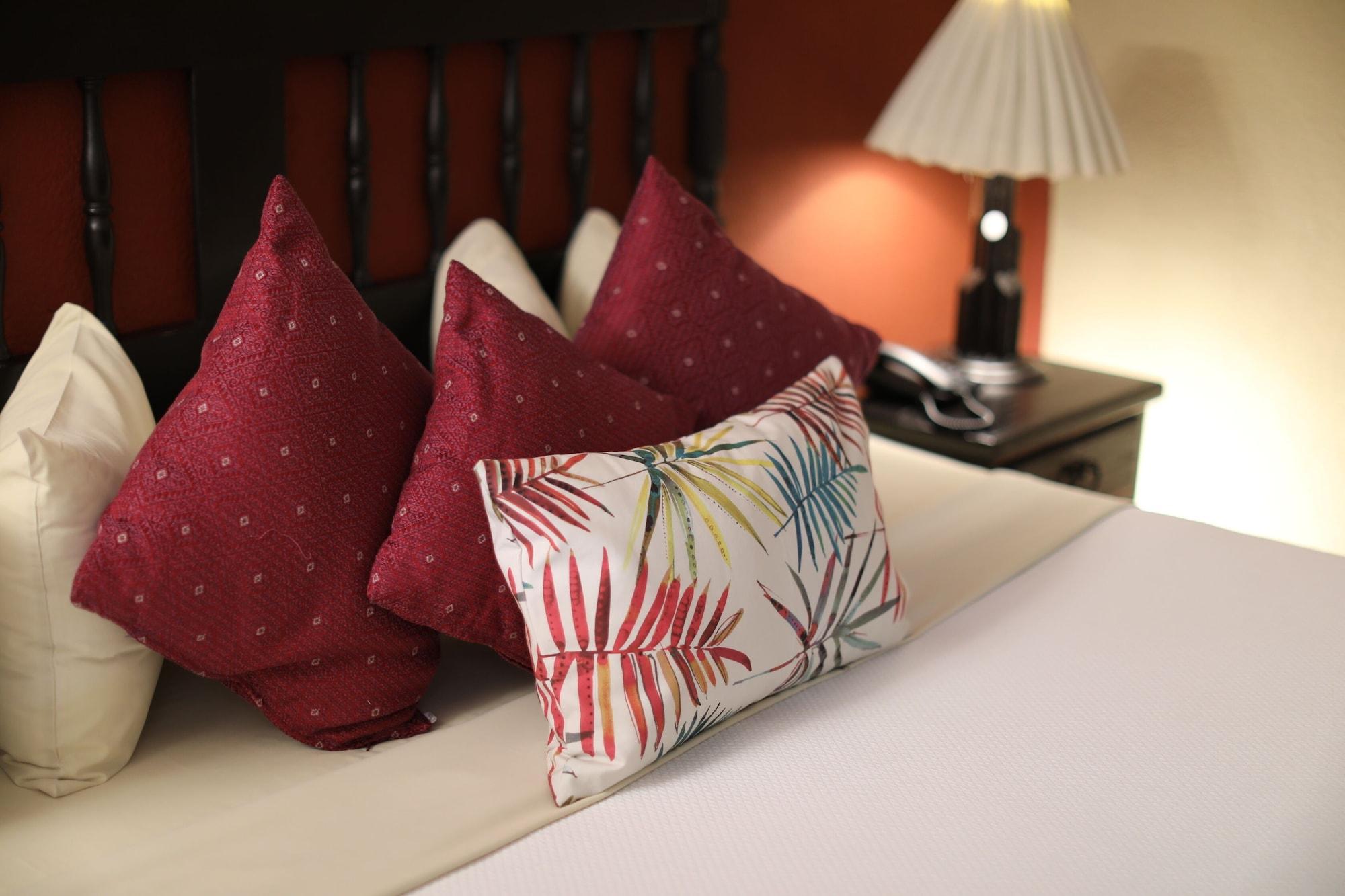 Hotel Montetaxco Exteriér fotografie Pillows on a bed