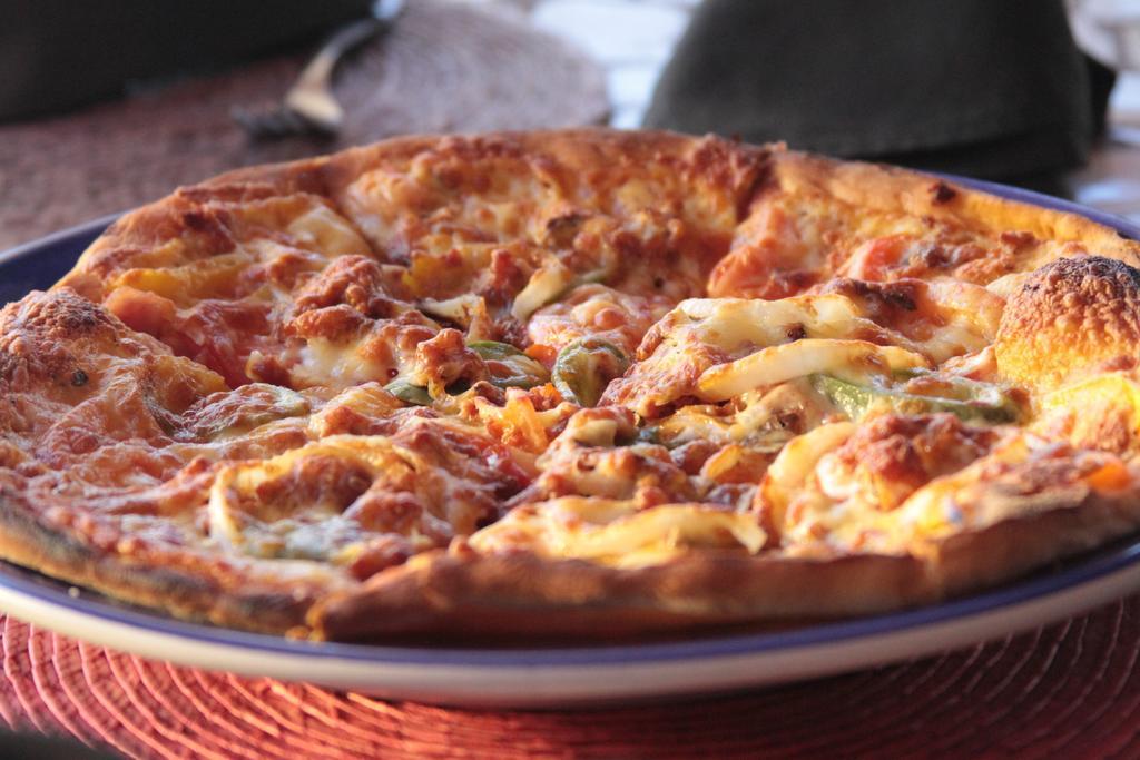 Hotel Montetaxco Exteriér fotografie A pizza